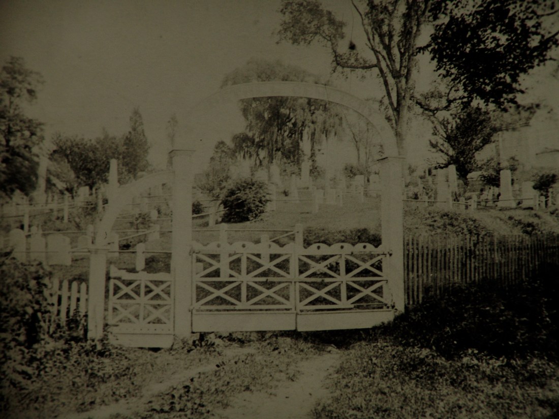 Unretouched image of the entrance gate to Bethel Cemetery.